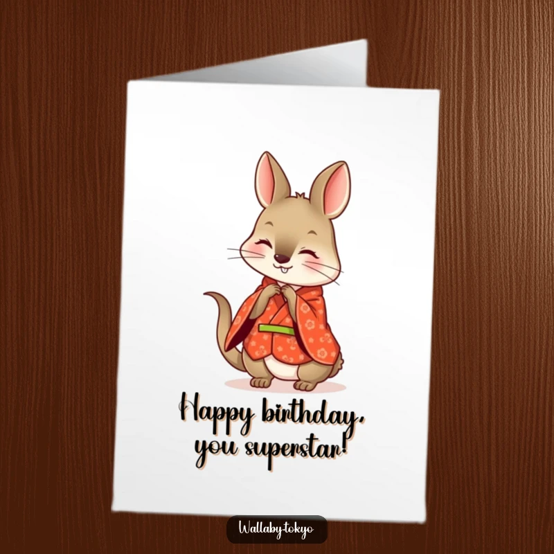 Funny Free Printable Birthday Card: Wallaby in a red kimono playfully bowing with a joyful and happy expression.