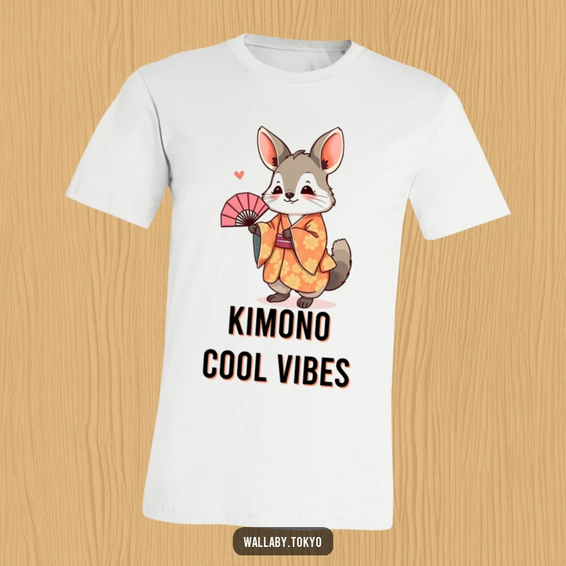 Funny T-Shirt depicting a wallaby in a colorful patterned kimono, joyfully bowing with a fan, a humorous cultural design.